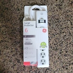 6-OUTLET Surge Protector, 3FT Cord, 800 Joules, Childproof, White. Fixed Price $11.99.