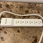 Belkin 6-OUTLET BE106001-06R Power Strip Surge Protector 5FT Cord Works. Fixed Price $12.00.