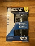 Tripp Lite 10 Outlet Surge Protector New. Fixed Price $30.00.