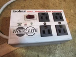 Tripp Lite Isobar Ultra 4 Diagnostic Surge Supressor. Fixed Price $15.00.