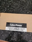 Cyberpower CSB6012 Essential Surge Protector 1200J 125V Outlet 12FT Cord Black. Fixed Price $14.00.
