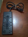 Insignia 8-OUTLET Surge Protector (NS-HW503-C). Fixed Price $13.50.