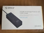 Orico Outlet Surge Protector With Usb Charger Model IPC-2A4U. Fixed Price $15.99.