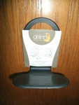 New Cell Phone Charging Station, Black, Wall Outlet Mount, Hanging Mobile Holder. Fixed Price $9.95.