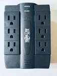 Tripp-lite 6 Outlet Swivel Adjustable Plug-in Surge Protector. Fixed Price $7.95.