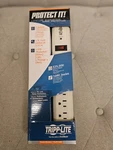 Tripp Lite TLP74RB Surge Protector. Fixed Price $10.00.