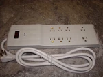 Belkin 8 Outlet Surge Protector With 6 Ft Power Cord & Telephone Protection. Fixed Price $19.95.