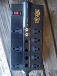 Tripplite Surge Protector 8 Outlets 10' Cord. Fixed Price $18.95.