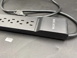 Belkin Home/office BE106001-04 Blk 6-OUTLETS Surge Suppressor. Fixed Price $17.99.