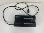 Tripp Lite Battery Backup Internet 600U 8 Outlet. Fixed Price $30.00.