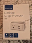New Insignia Desktop Surge Protector 1-OUTLET/2-USB White 5' Cord NS-PDSU128. Fixed Price $14.49.