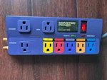 Monster Power Center AV800 Multi Colored Strip/surge Protector Purple. Fixed Price $25.99.