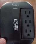 Tripp Lite Swivel 6 Surge Protector, 3 Rotatable Outlets, Black. Fixed Price $15.79.