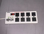 Tripp Lite Series Isobar 8-OUTLET Surge Protector, 25 Ft. Cord Used Once. Fixed Price $79.99.