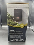 Hampton Bay DIY-300PS Low-voltage 300W Landscape Lighting Transformer, Dd Sensor. Fixed Price $90.00.