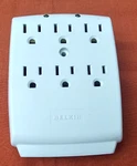 Belkin 6-OUTLET Wall Mount Surge Protector Ag. Fixed Price $9.99.