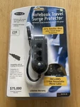 New Belkin Notebook Travel Surge Protector Model F5C791-C8 Never Opened. Fixed Price $9.00.