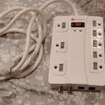 Utilitech Surge Protector 8-OUTLET 125V 15A Model 4120YLPT18B Power Strip. Fixed Price $35.00.