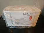 Bluelounge Cablebox Mini Organizer, White 9.3"X4.6"X5". Fixed Price $25.00.